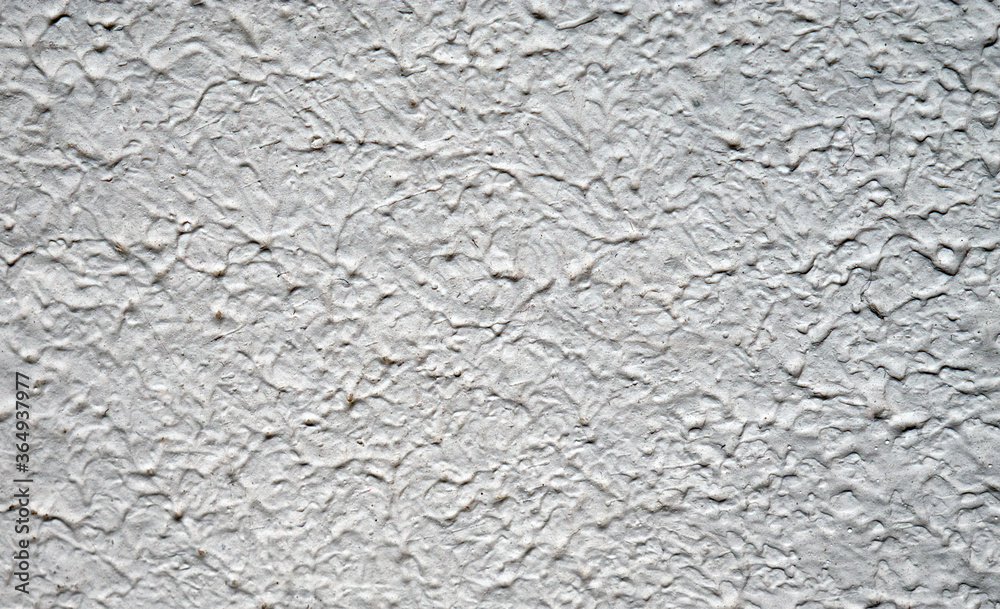 Abstract background and texture from a close-up of a woodchip wall, macro Abstract background and texture from a close-up of a woodchip wall, macro