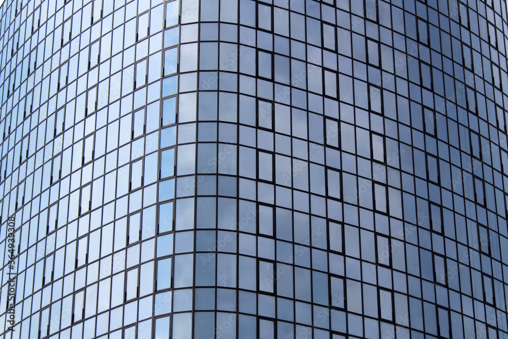 Glass and metal skyscraper, background