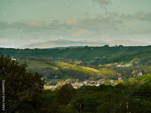 Village of Llangeitho in the county of Ceredigion with Plynlimon/Pumlumon Fawr 752m or 2,467ft 20 miles in the distance, it’s the highest point in mid-Wales and the source of the rivers Wye and Severn photo