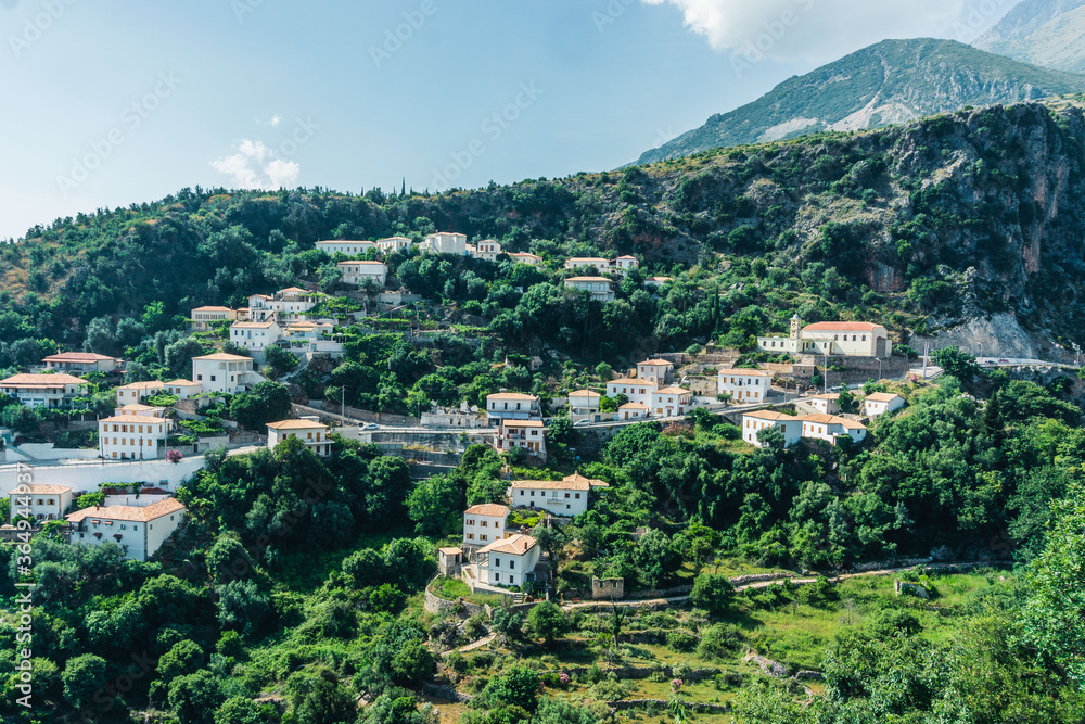 The stunning mountain town of Dhermi, stuck in the middle of Albanian alps and your houses with dozens of windows, Albania.
