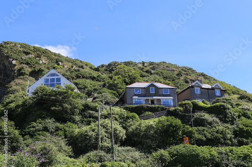 Houses above the Mawddach estuary at Barmouth, Gwynedd, Wales, UK. photo