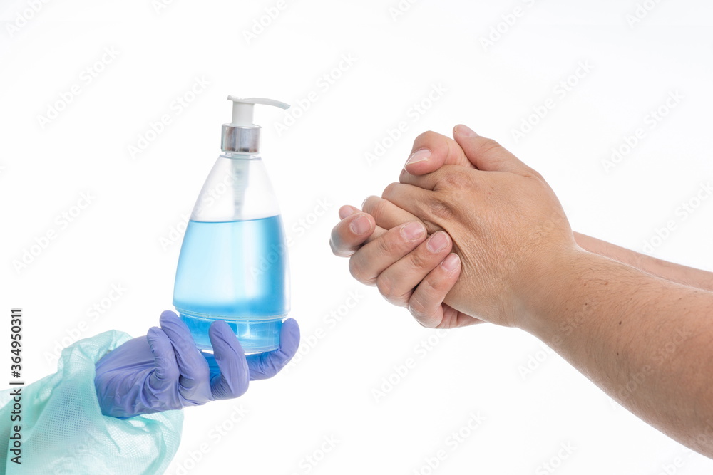 Doctor offering hand sanitizer to patient on white background Doctor offering hand sanitizer to patient on white background