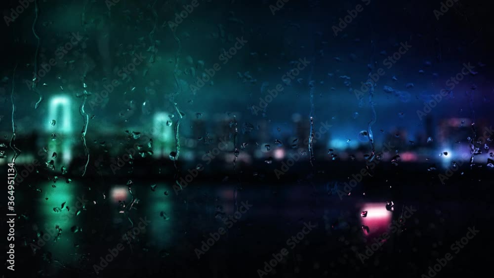 Beautiful cinematic rainy city window backdrop A rain covered window with blurry city lights bokeh background and raindrops running down the glass