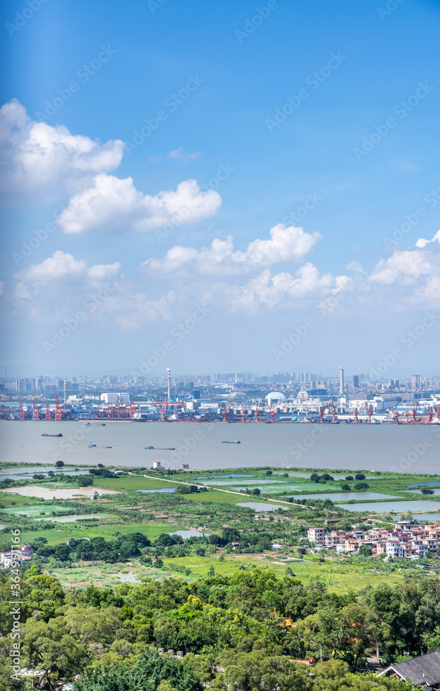 Fototapeta premium Lianhua Mountain, Panyu, Guangzhou, China overlooks Dongguan Xinsha Port