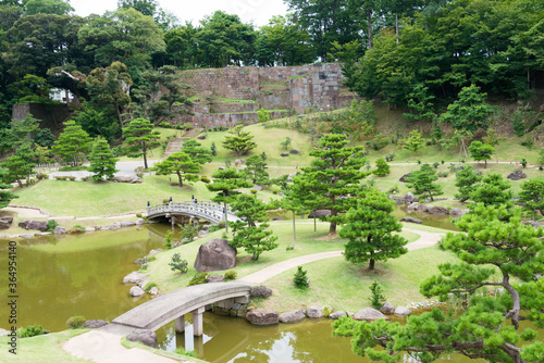 Traditional Japanese Garden at Kanazawa Castle Park in Kanazawa, Ishikawa, Japan. a famous historic site. photo