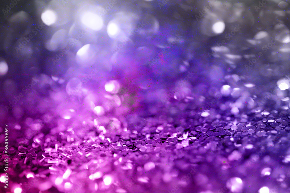 Abstract glitter background with bokeh defocused lights. 