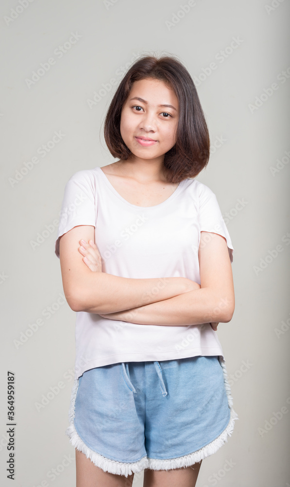 Portrait of young beautiful Asian teenage girl with short hair Portrait of young beautiful Asian teenage girl with short hair