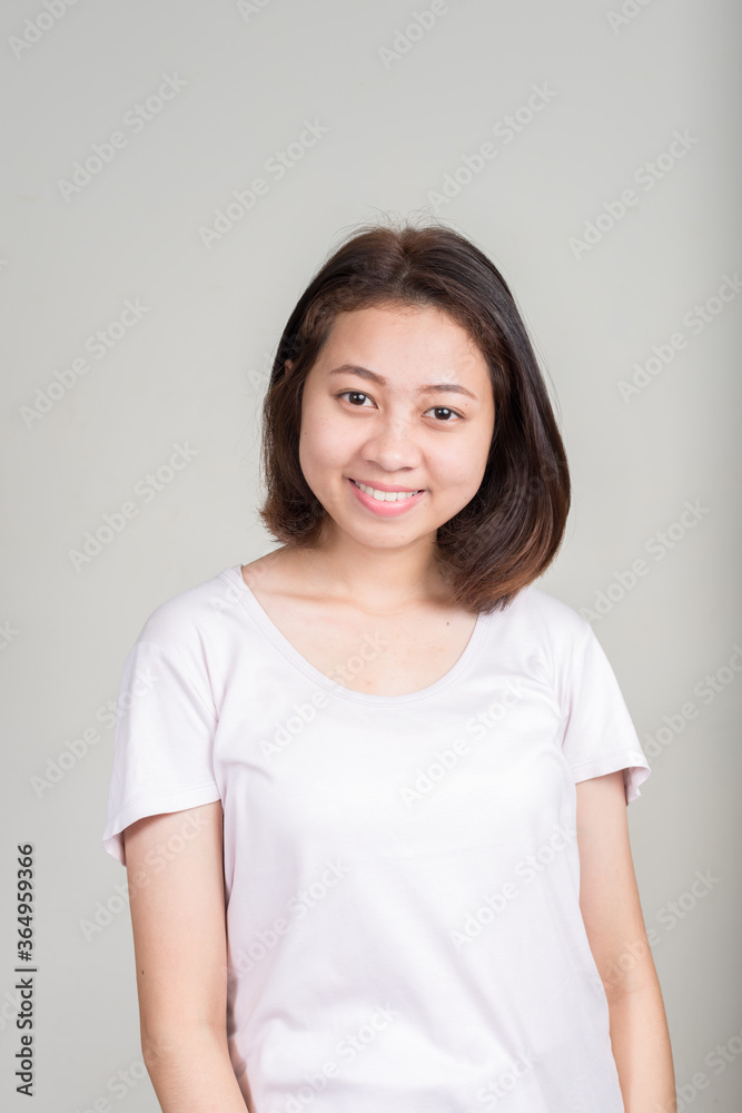 Portrait of young beautiful Asian teenage girl with short hair Portrait of young beautiful Asian teenage girl with short hair