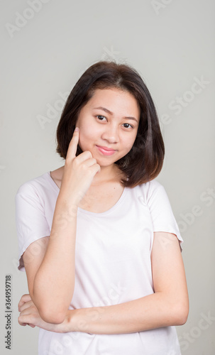 Portrait of young beautiful Asian teenage girl with short hair