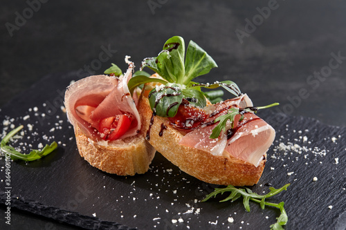 canape with meat  and vegetables photo