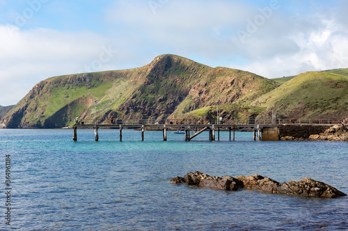 The iconic jetty with rolling green hills in the background  on the fleurieu peninsula at second valley south australia on july 14 2020 photo