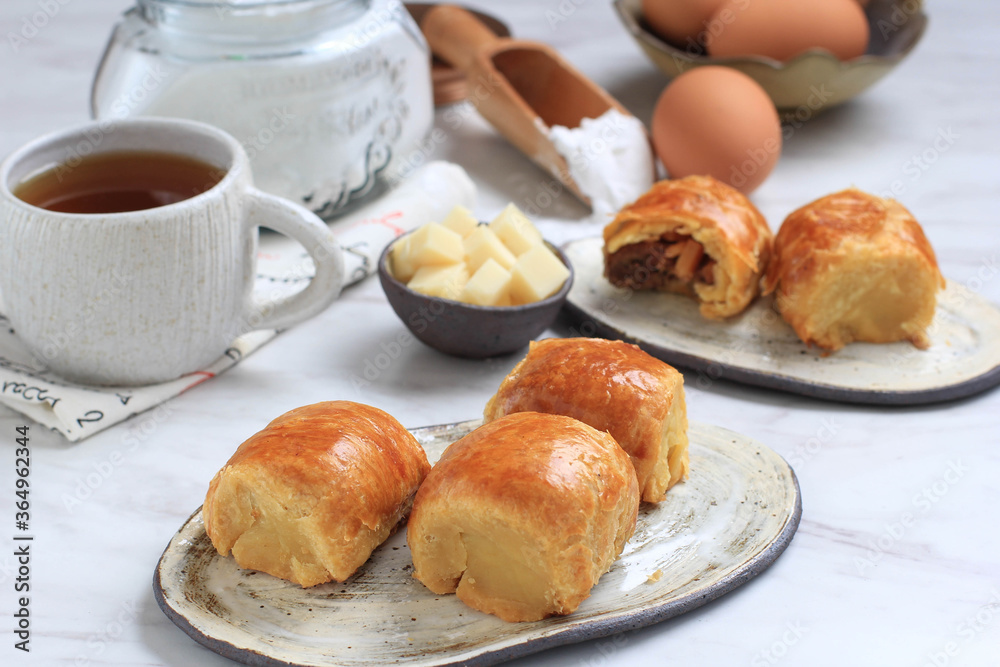 Bolen Pisang or Banana Wrapped with Puff Pastry, Typically Food from Bandung. Popular as Bolen Bandung Bolen Pisang or Banana Wrapped with Puff Pastry, Typically Food from Bandung. Popular as Bolen Bandung