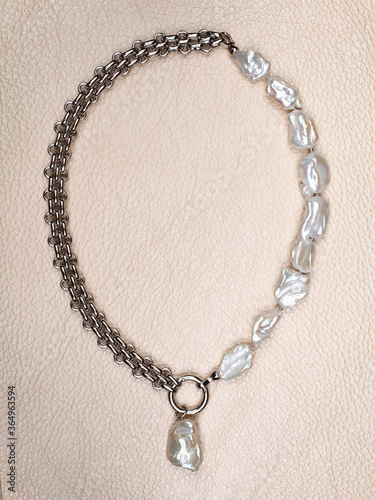 Wallpaper Mural Luxury elegant baroque pearl necklace on beige leather background Torontodigital.ca