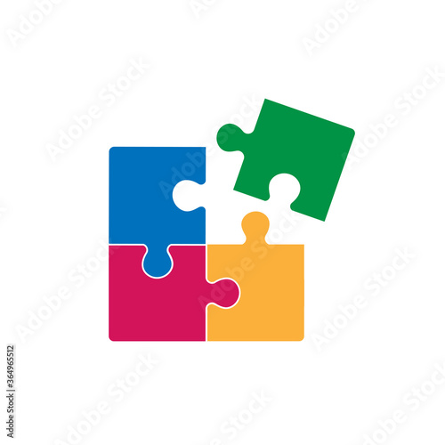 Puzzle - Vector icon. Set of four colorful piece puzzle on white background. © Vik10