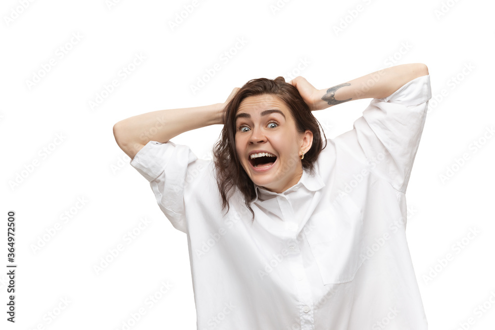 Going crazy. Young caucasian woman with funny, unusual popular emotions and gestures on white studio background. Human emotions, facial expression, sales, ad concept. Trendy look inspired by memes. Going crazy. Young caucasian woman with funny, unusual popular emotions and gestures on white studio background. Human emotions, facial expression, sales, ad concept. Trendy look inspired by memes.