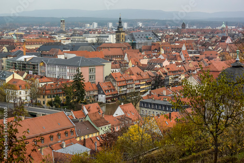 Fototapeta Naklejka Na Ścianę i Meble -  View of traditional houses with typical red tiled rooftops in Bamberg, Bavaria, Franconia, Germany. November 2014