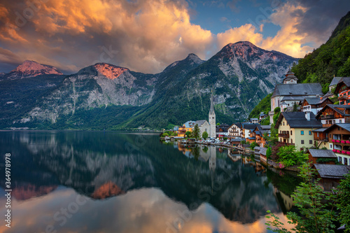 Hallstatt, Austria. Image of famous alpine village Hallstatt at dramatic summer sunset.	