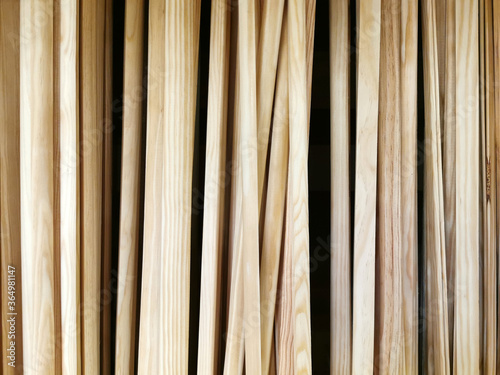 Several sheets of new clean plywood in a stack. Sale of goods for repair and decoration. Wood and texture. Abstract background and shallow depth of field.