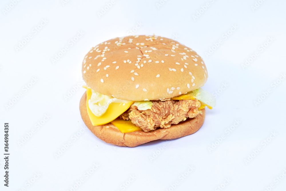 crispy fried chicken cheese hamburger on white background crispy fried chicken cheese hamburger on white background
