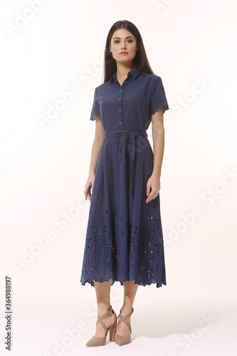 business woman executive posing in formal blue long skirt summer dress