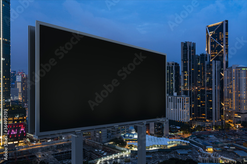 Photography Blank black road billboard with KL cityscape background at night time