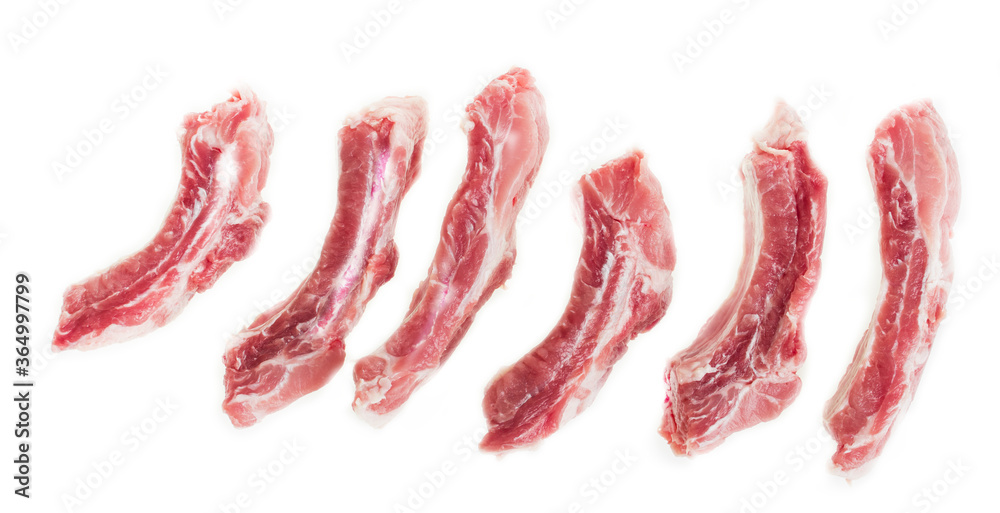 Sliced raw pork ribs on a white background, isolate Sliced raw pork ribs on a white background, isolate