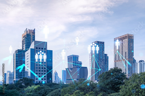 Social media icons hologram over panorama city view of Bangkok  Asia. The concept of people networking and connections. Double exposure.