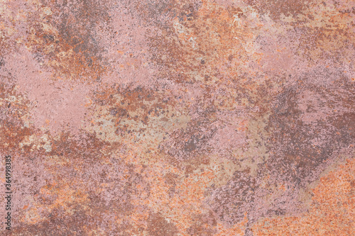 Metal surface with brown and orange paint flaking and cracking texture. Rusty Multicolored background. 