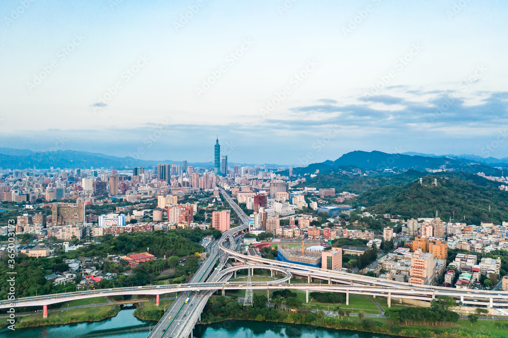 Obraz premium Taipei City Aerial View - Asia business concept image, panoramic modern cityscape building bird’s eye view under sunrise and morning blue bright sky, shot in Taipei, Taiwan