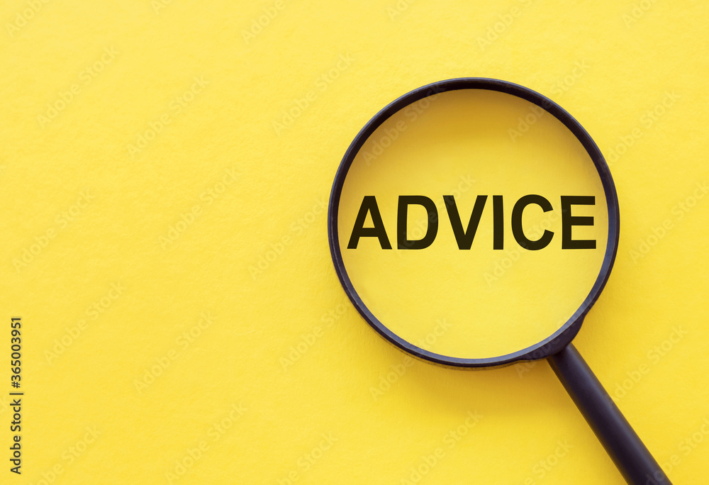 Advice. magnifier glass with text on yellow background Advice. magnifier glass with text on yellow background