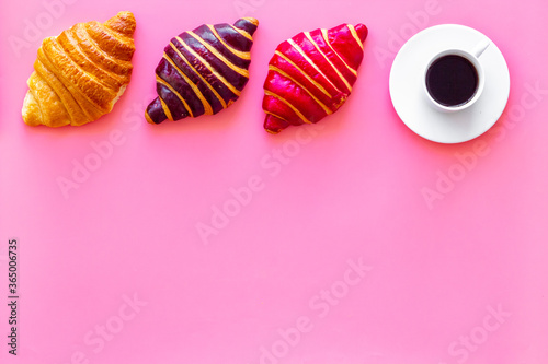 Set of coffee with croissants - chocolate, berry, classic - on pink top view © 279photo