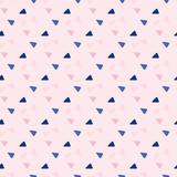 Triangular shapes seamless pattern. Blue and lilac geometric elements on pink background. Abstract design.