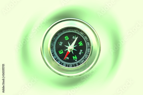 round compass on abstract background as symbol of tourism with compass, travel with compass and outdoor activities with compass © yarbeer