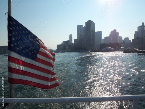 American Flag with Boston Massachusetts city skyline from the water 2008