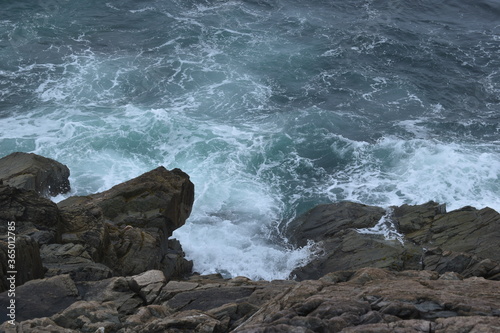 Waves crashing on rocks