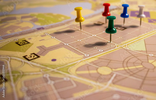 Closeup shot of colorful pins in street map