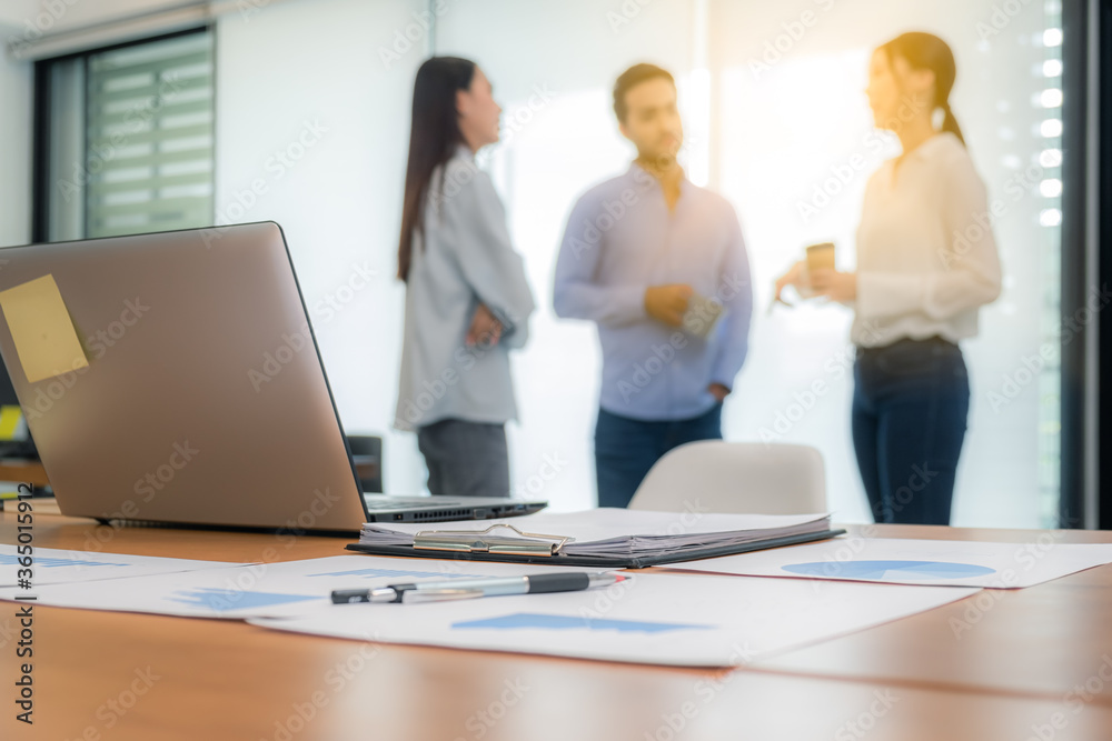 Young business group explaining new business ideas to peers. Business people discussing in meeting room. Young business group explaining new business ideas to peers. Business people discussing in meeting room.