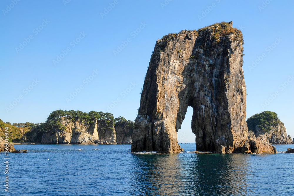 Seascape with arched rock. Far Eastern State Marine Reserve, Peter the Great Gulf of Sea of Japan, Primorsky Krai (Primorye), Far East, Russia.