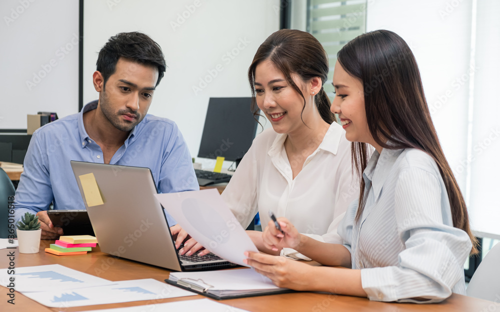 Young business group explaining new business ideas to peers. Business people discussing in meeting room. Young business group explaining new business ideas to peers. Business people discussing in meeting room.