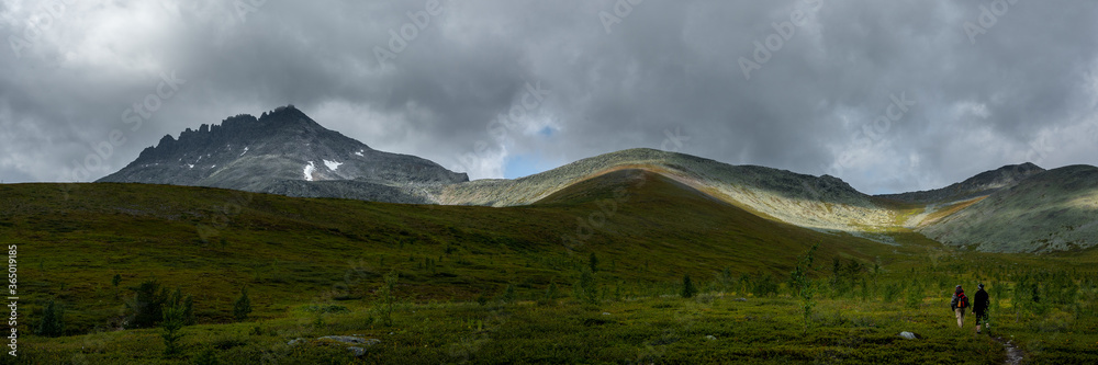 Amazing mountain landscape with colorful sky. Travel and hiking concept. Mountain landscape Subpolar Urals. Amazing mountain landscape with colorful sky. Travel and hiking concept. Mountain landscape Subpolar Urals.