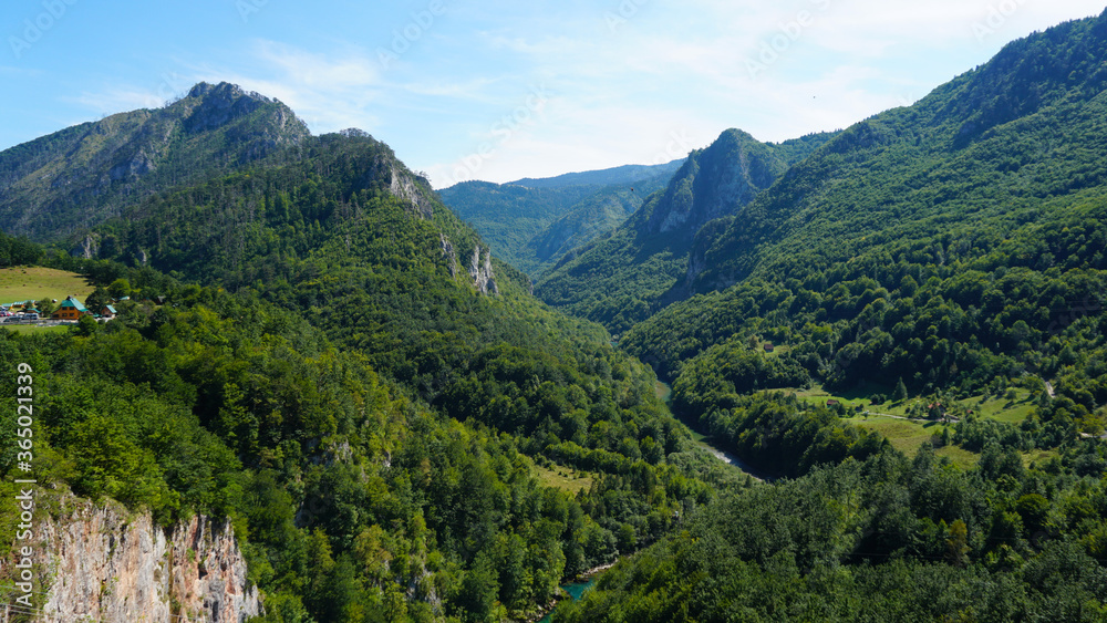 River in the mountains, landscape, top view. Wild nature. Mountains, green forest. Tourist route. Montenegro.