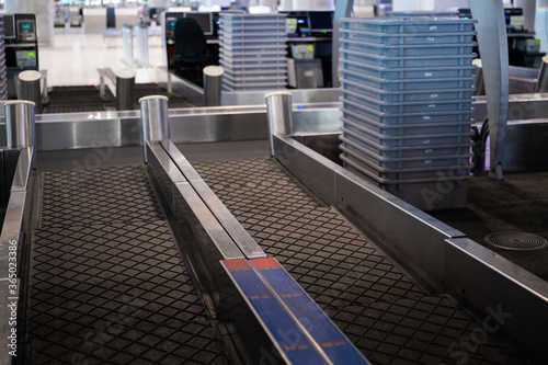 Empty airport check-in counter while coronavirus pandemic and countries lockdown, flight cancellation, bankrupt