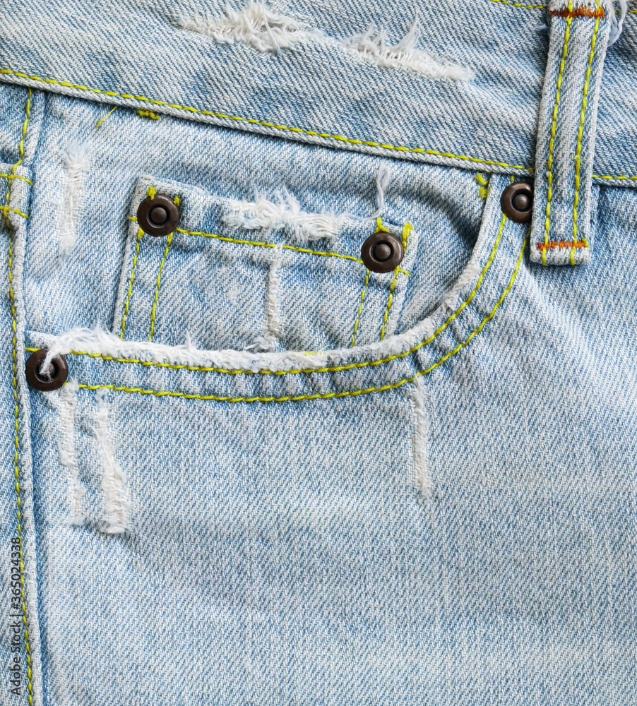 Blue denim Jeans pocket texture background closeup Blue denim Jeans pocket texture background closeup