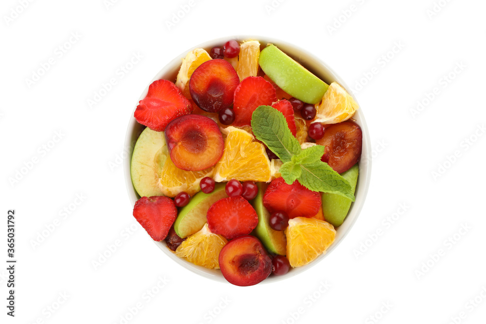 Bowl of fresh fruit salad isolated on white background