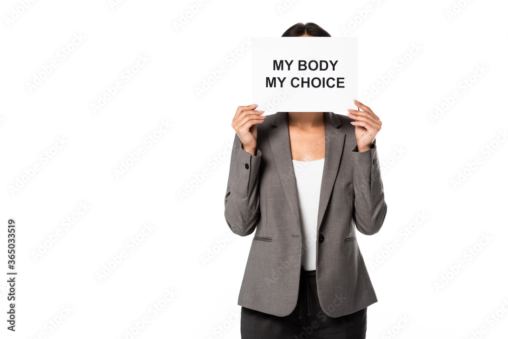 Φωτογραφία businesswoman covering face while holding placard with my body my choice letteri