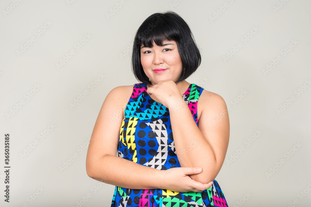 Portrait of young beautiful overweight Asian woman Portrait of young beautiful overweight Asian woman