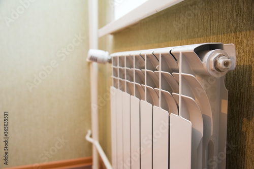 New white radiator on the wall