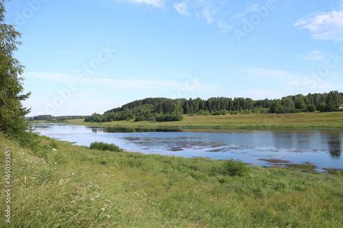 Sunny day on the river in the countryside