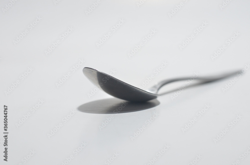 Isolated spoon shining on white Background Isolated spoon shining on white Background