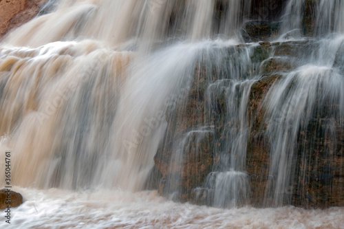 Waterfall Flowing over Rocks